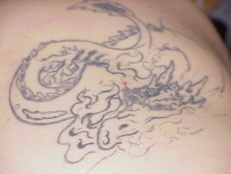 What would Freud say about this dragon tattoo?  Hmmmm....